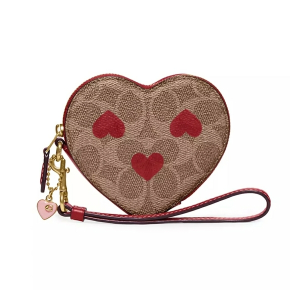 Coach Handbags - COACH Monogrammed Heart-Shaped Wristlet